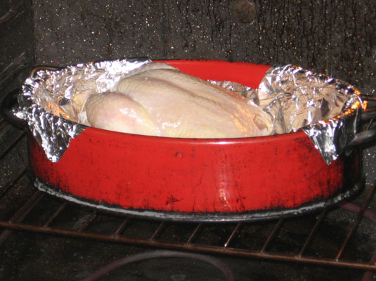 Place the chicken in the oven and roast for 45 minutes.
