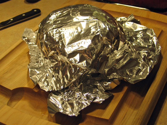 Transfer the chicken to a carving board or serving platter, cover with aluminum foil, and let rest for 10 to 15 minutes.