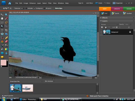 In the source image, use a selection tool to select the content that you want to copy.