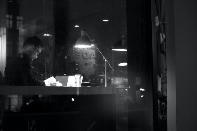 Man Studying at Night