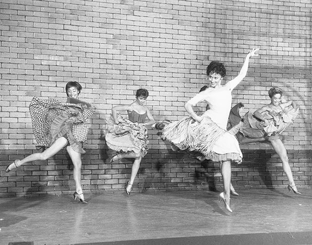Photo of Chita Rivera dancing in the Broadway musical West Side Story