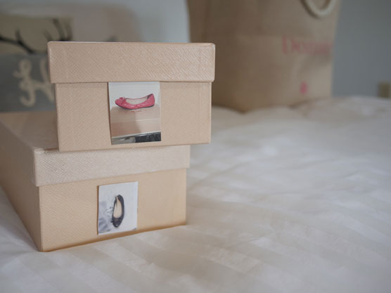 shoeboxes with photo labels