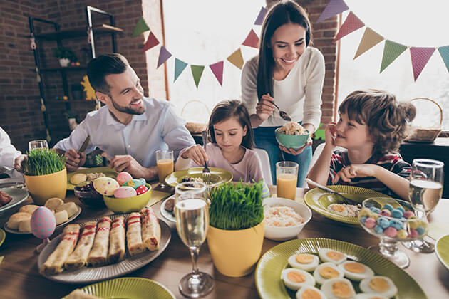 Photo of a young family enjoying an Easter dinner