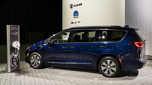 Photo of a blue minivan, a plug-in hybrid electric vehicle.