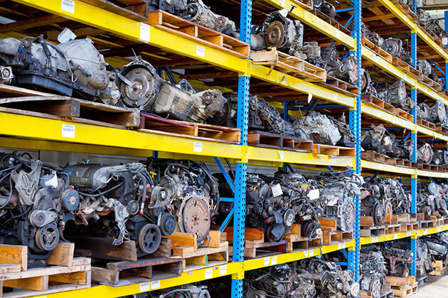 Photo of vehicle engine blocks on shelves