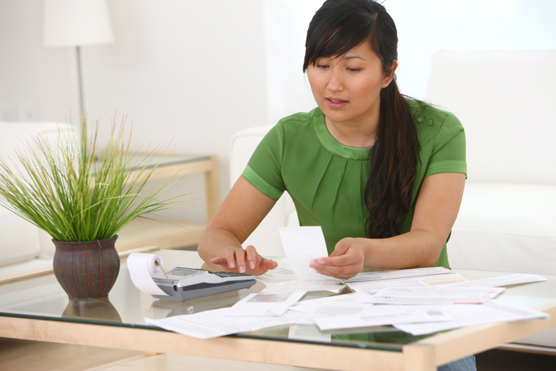 young woman working on her finances