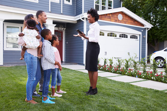 realtor showing home to family