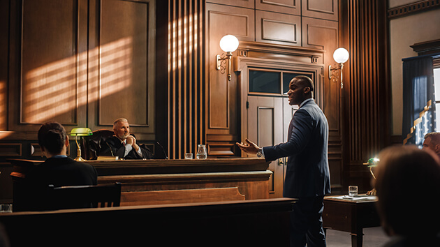 Photo of lawyer speaking in a courtroom
