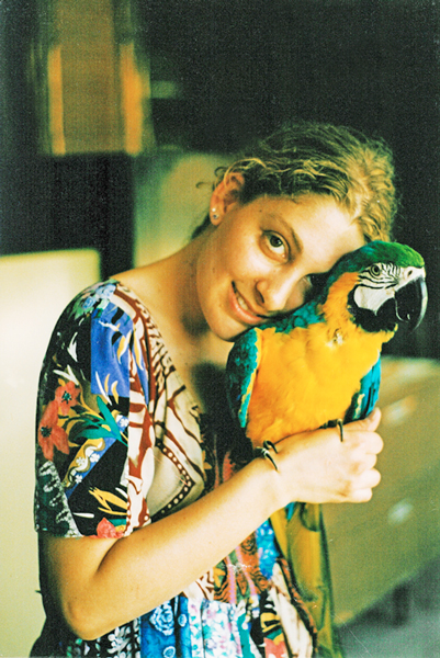 parrot and woman bonding