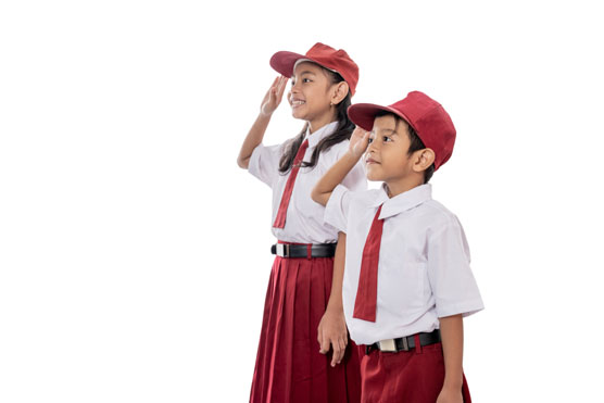 children saluting flag