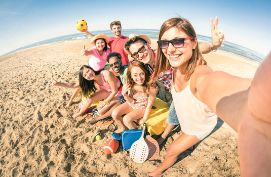 group selfie on the beach