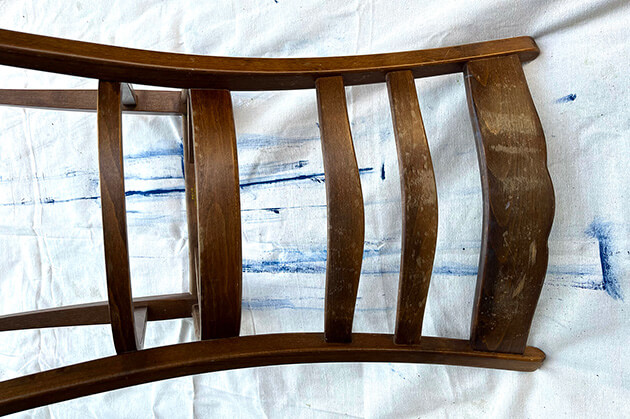 Photo of water damage on an antique chair